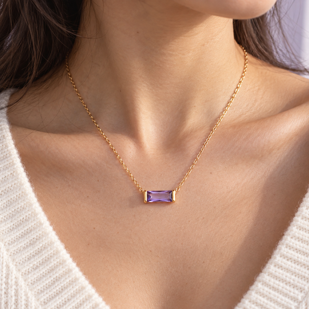 AI-generated on-body styling image of Birthlight CZ Birthstone Necklace — Rose & Clay. Shown: Gold · February-color CZ. Illustrative fit; see original product photos and measurements.