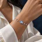 AI-generated on-body styling image of Starry Orbit Sterling Silver Bracelet — Wimsico. Shown: Silver · blue moonstone. Illustrative fit; see original product photos and measurements.