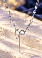 Styled editorial image of Starlight Opal Necklace; AI-created setting. Original product photo also included.