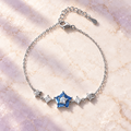 Styled editorial image of Stellar Blue Crystal Bracelet; AI-created setting. Original product photo also included.
