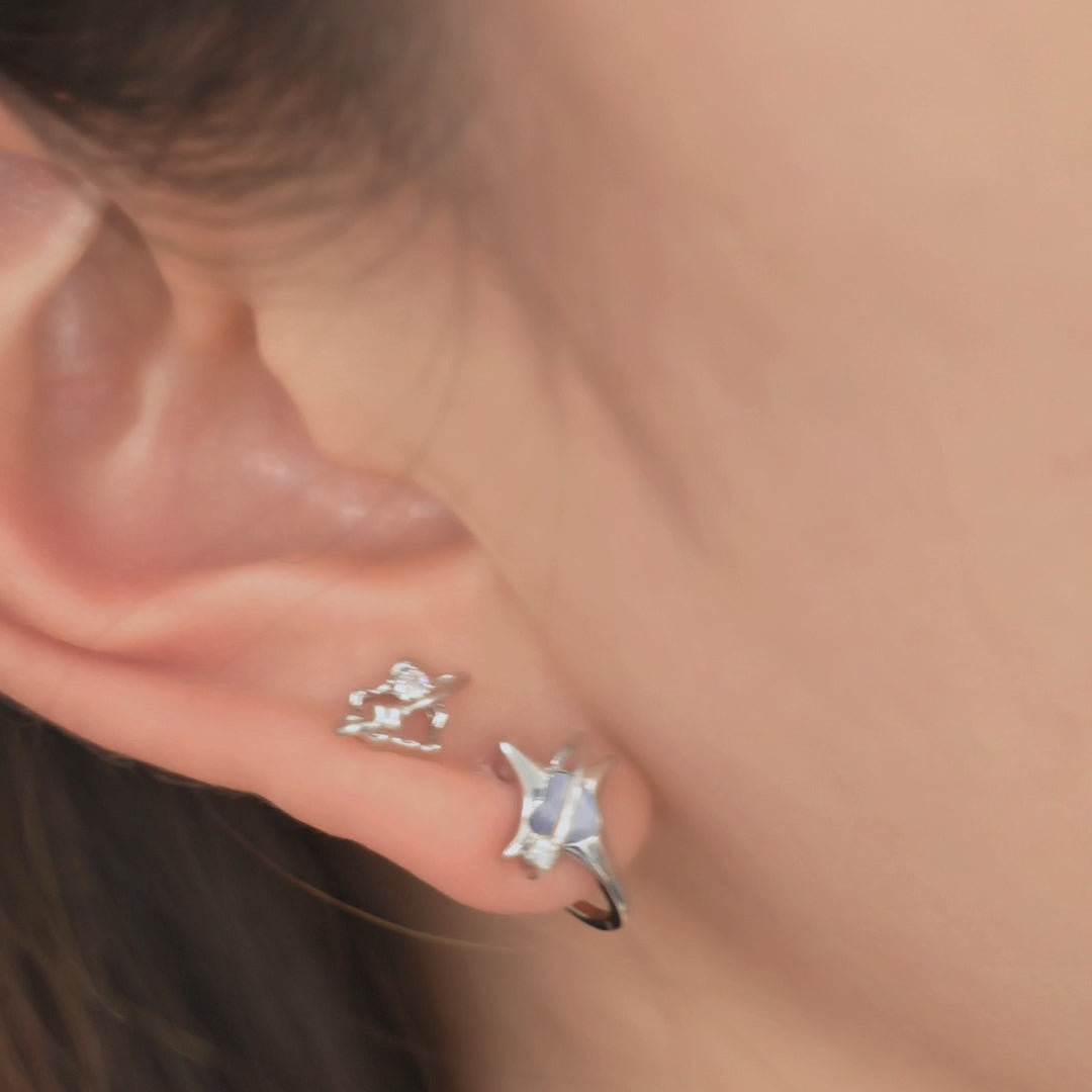 Blue Starlight Stud Earring Set shown worn in motion.