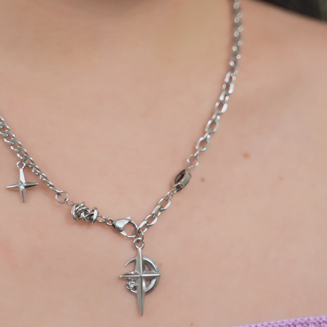 Stellar Moon & Star Necklace shown worn in motion.