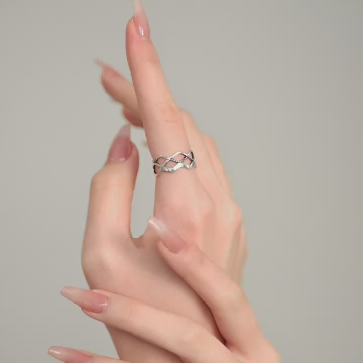 Starry Wave Adjustable Sterling Silver Ring shown worn in motion.
